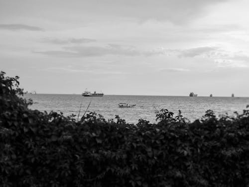 Black and White Photo of Ships on the Sea 
