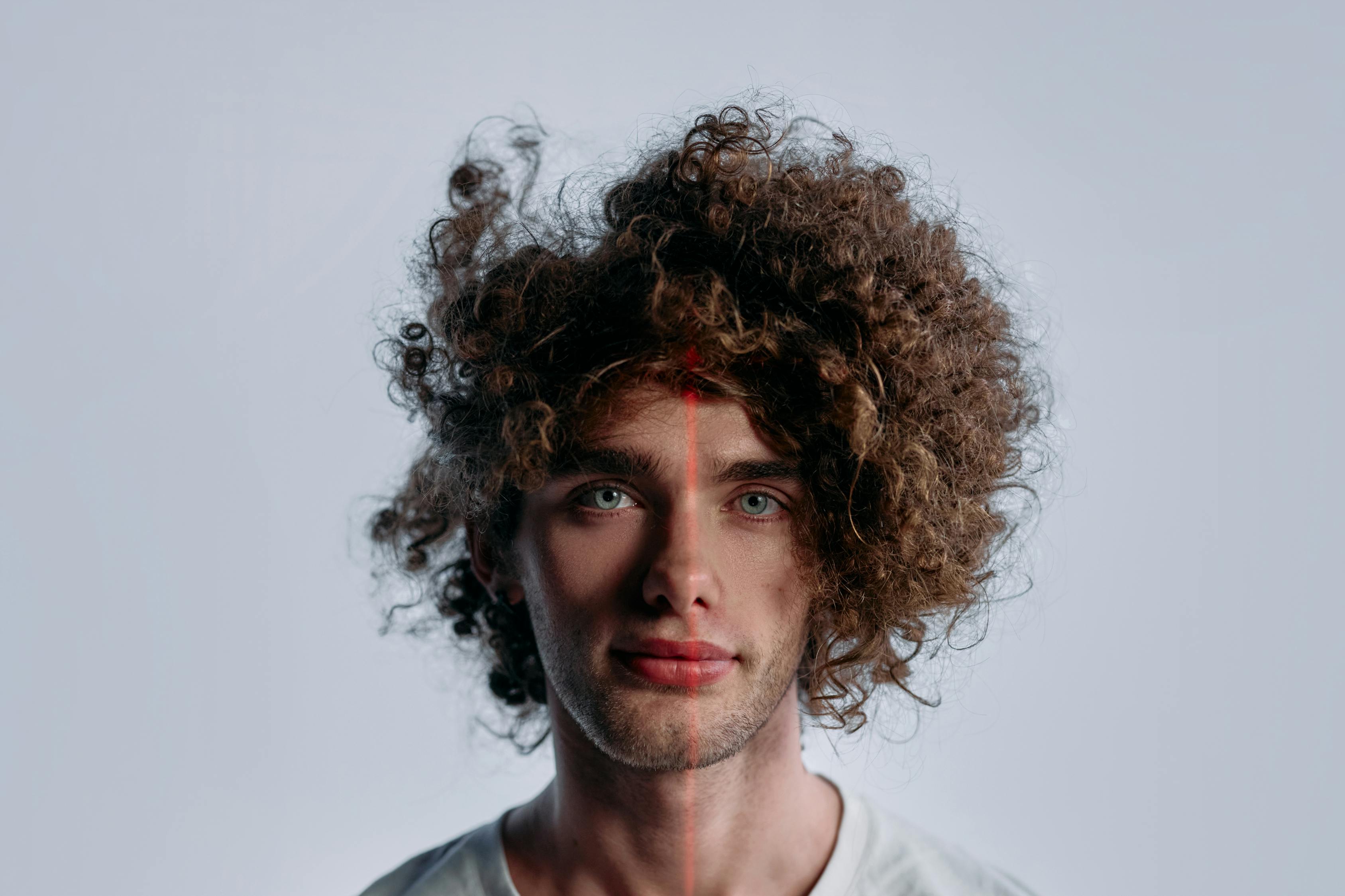 Close Up Photo Of Man With Brown Curly Hair Free Stock Photo close-up-photo-of-man-with-brown-curly-hair-free-stock-photo