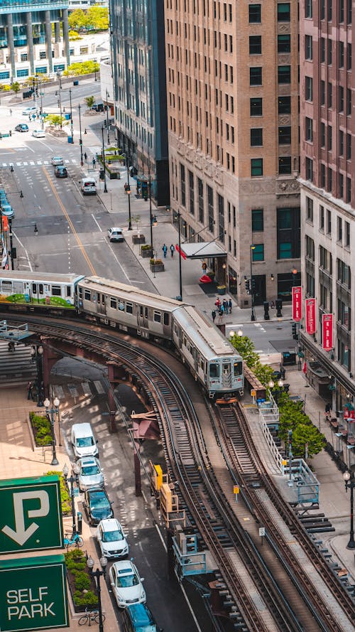 A Moving Train Near the Buildings