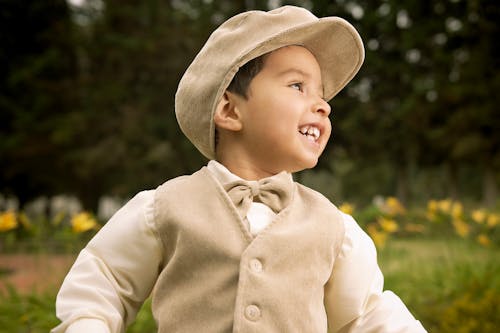 Free Adorable Boy Wearing Corduroy Flat Cap  Stock Photo