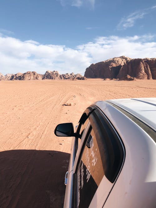 Car Driving on Sand in Jordan