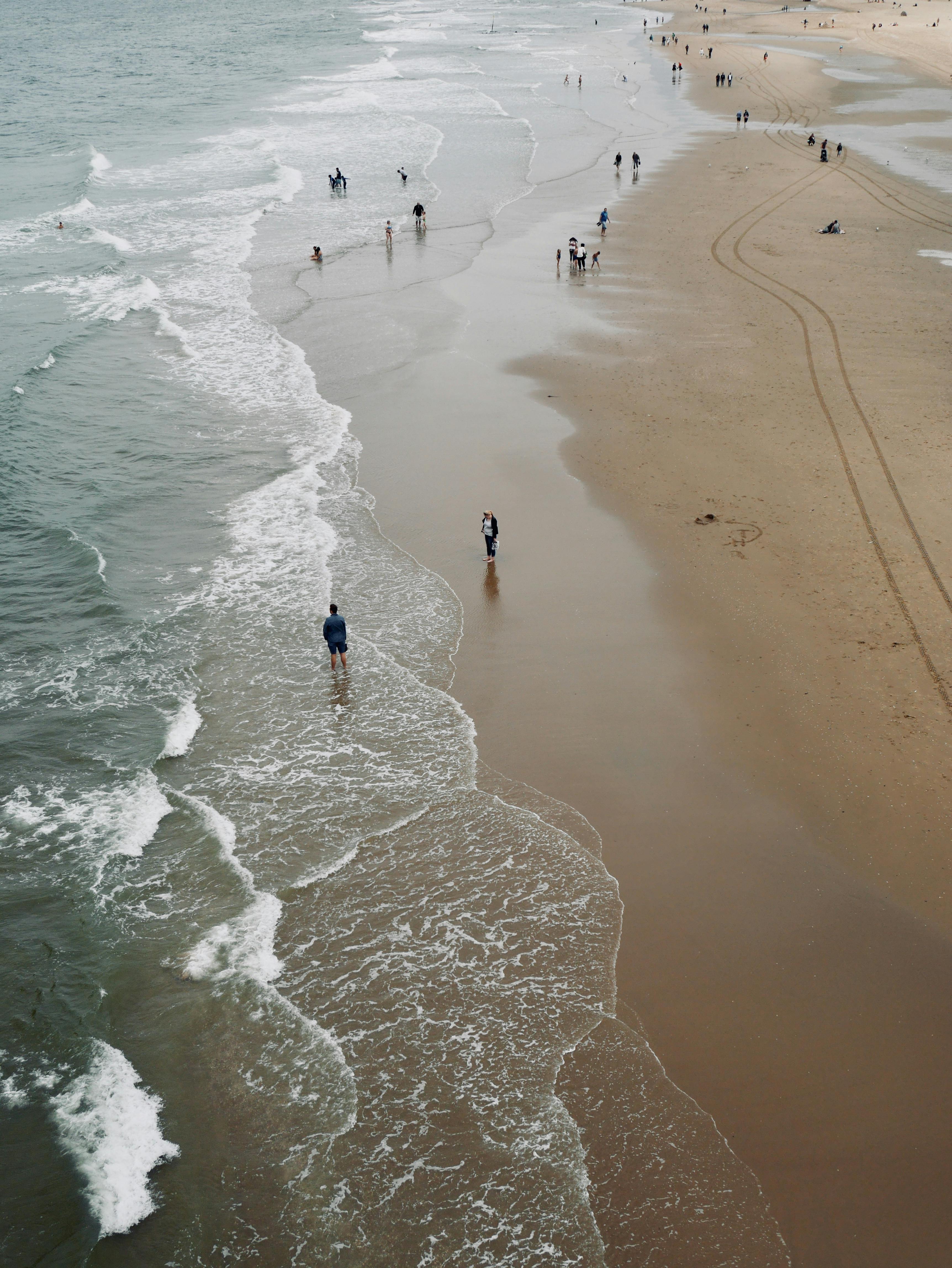Aerial view of people enjoying leisure time at Lahey Beach, The Hague, Netherlands.