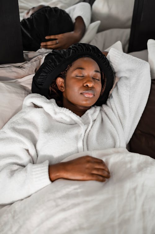 Free Woman Sleeping on Bed Stock Photo