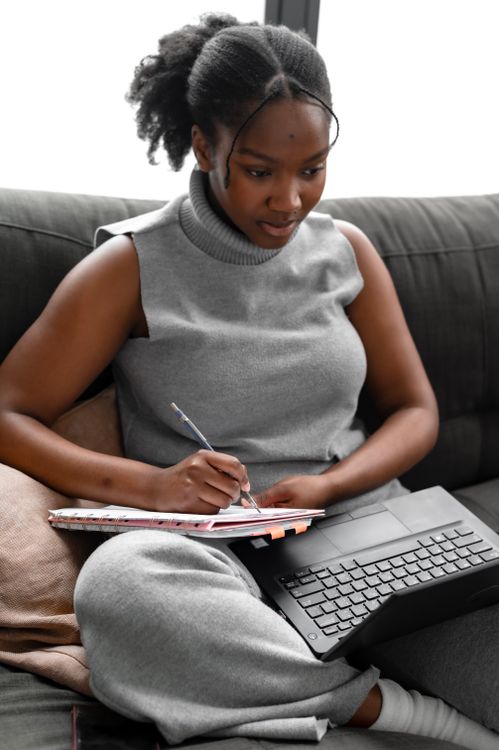 Taking Notes Scroller A Woman Taking Notes · Free Stock Photo