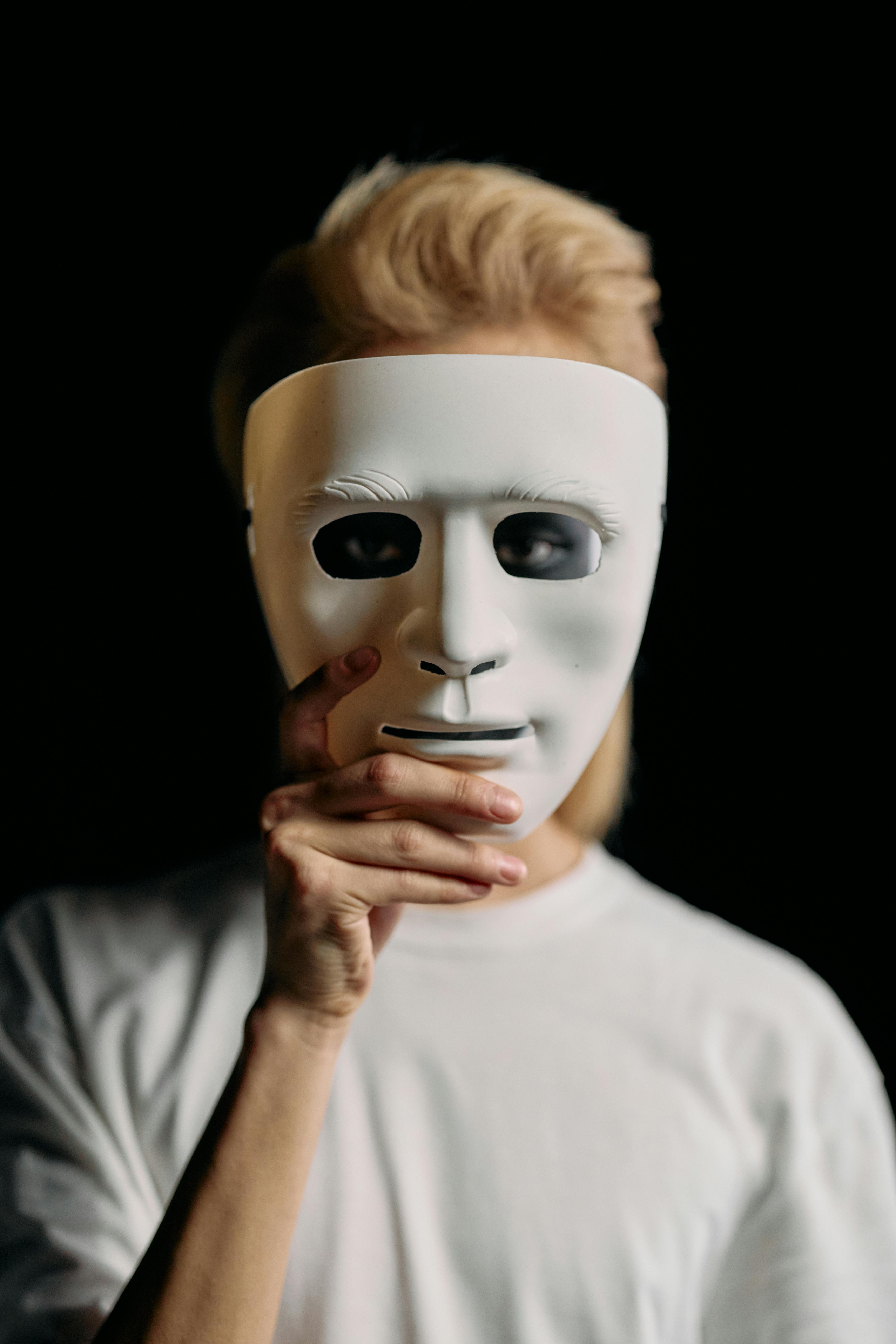 of Man Looking a Mask · Free Stock Photo