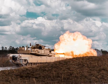 
A Tank Firing a Bullet
