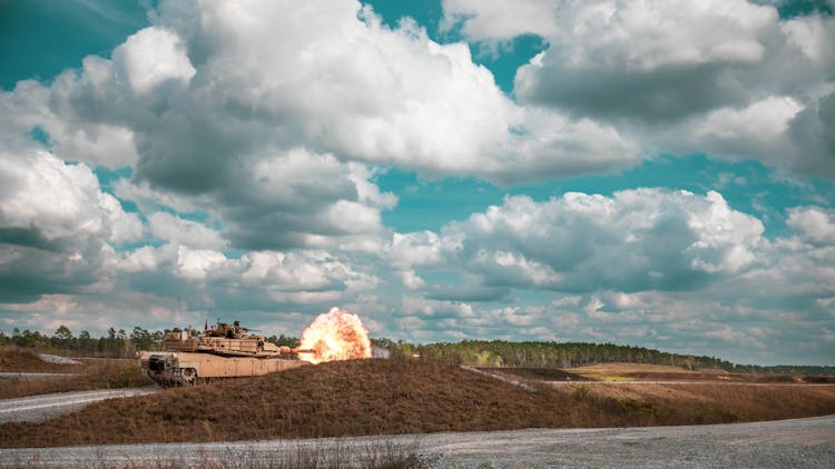 A Tank Firing A Bullet