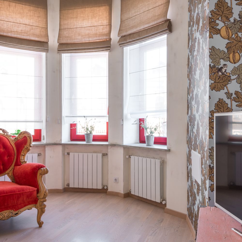 Wallpapering in Monken Hadley — dust sheets down and the room fully protected