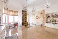 Brown Wooden Table Near Brown Floral Curtain