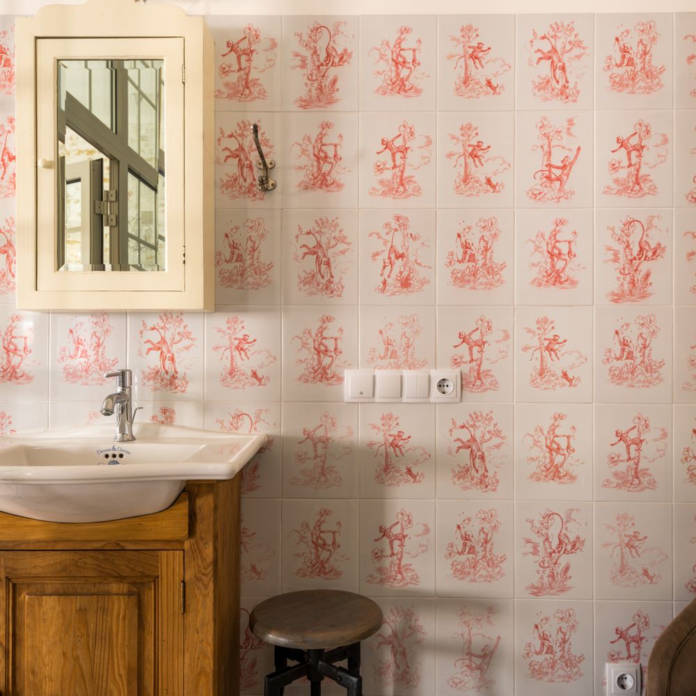 Wallpapering in Elephant and Castle — dust sheets down and the room fully protected