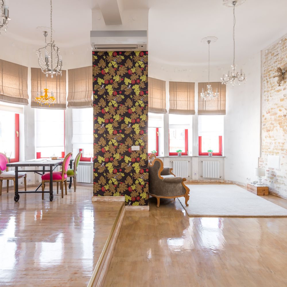 Wallpapering in Old Chiswick — woodwork brushed to a crisp, smooth line