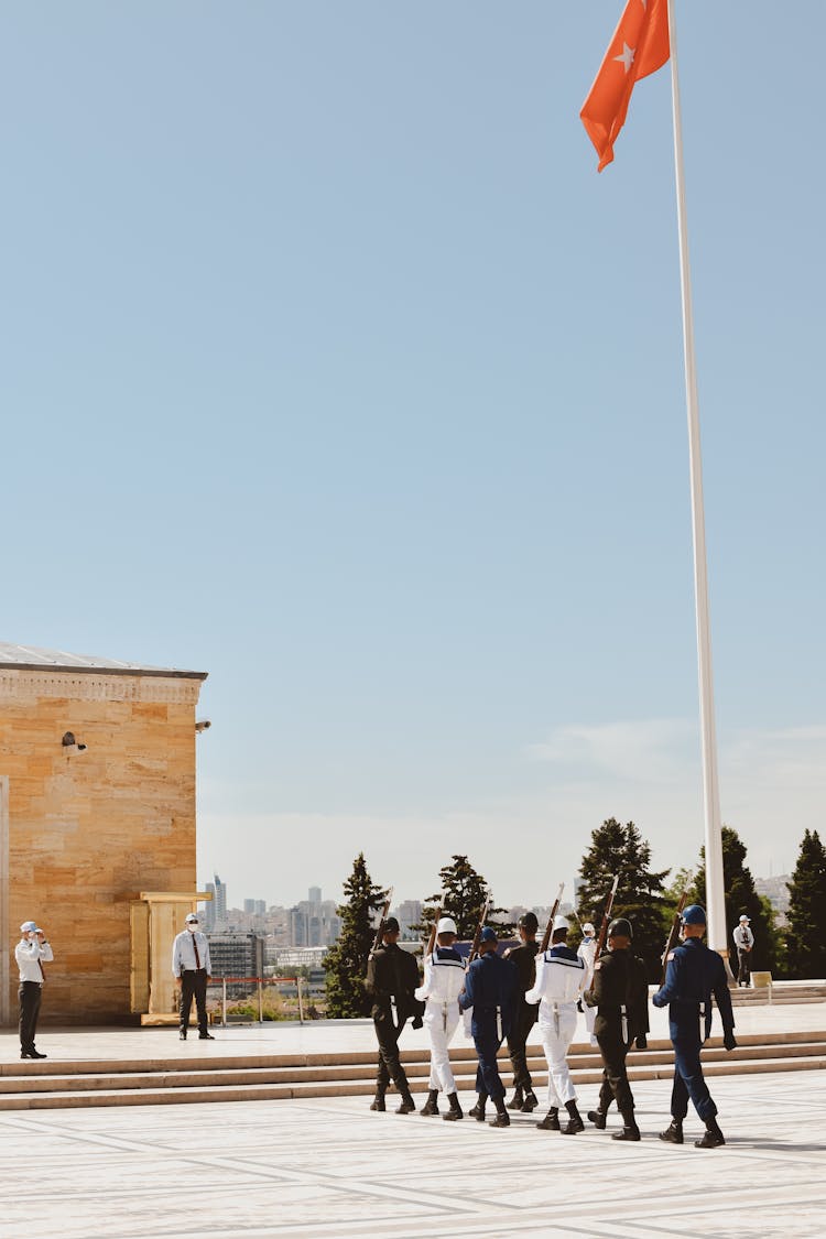 Soldiers And Flag Pole