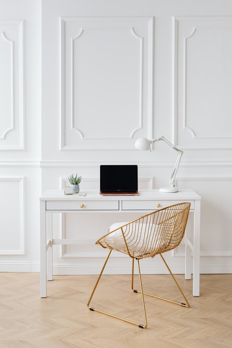 Laptop On Top Of White Table 