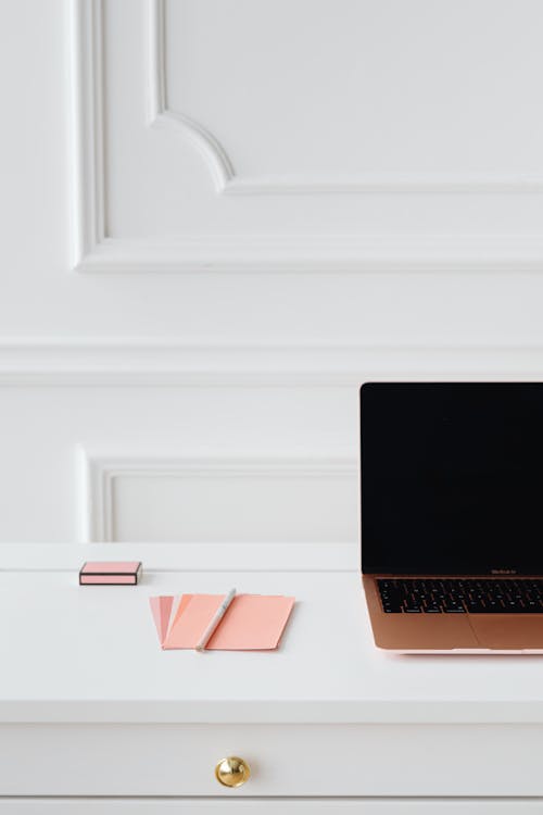 Macbook on a Wooden Table