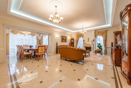 Free Spacious and elegant interior design featuring a luxe living room and dining area. Stock Photo