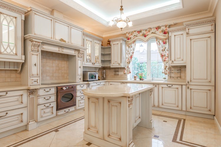 Brown And White Wooden Kitchen Cabinets