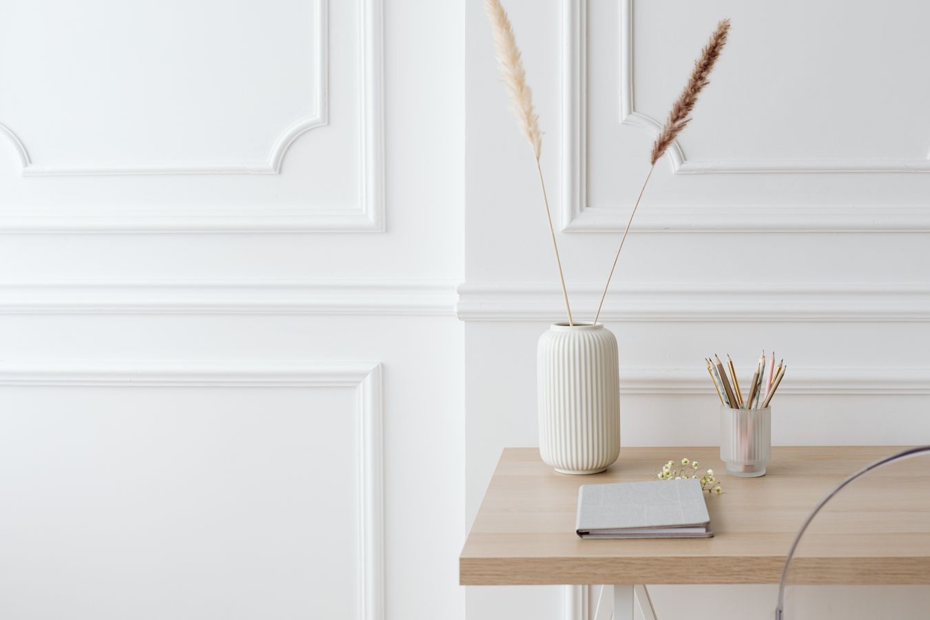 White panel molding and baseboard detail
