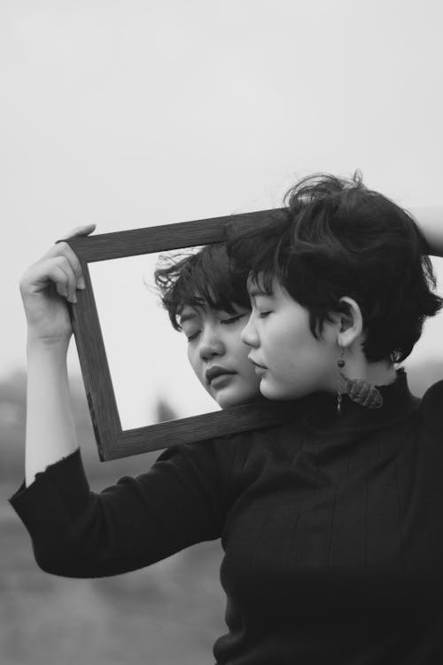 Free Photo of Woman Holding a Mirror Stock Photo