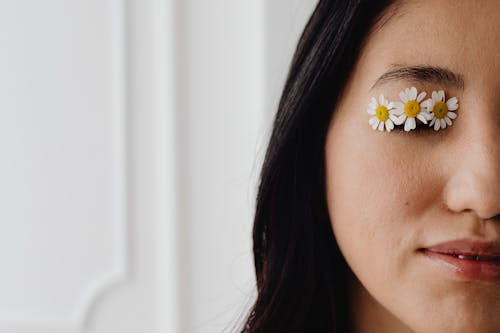 Free Woman With White Flower on Eye Stock Photo