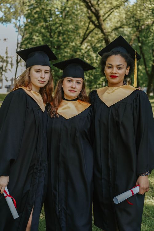 People Wearing Graduation Gowns · Free Stock Photo