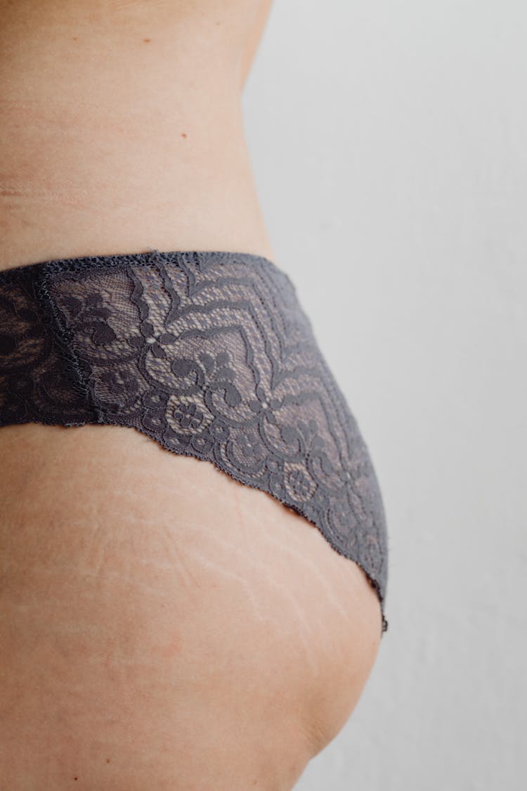 Person Wearing Black Lace Underwear