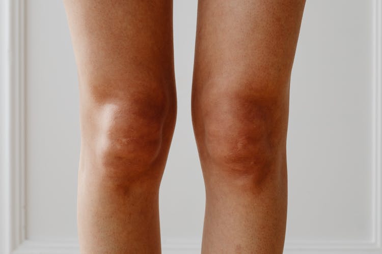 Close Up Of Female Legs And Knees