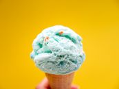 Person Holding Ice Cream Cone