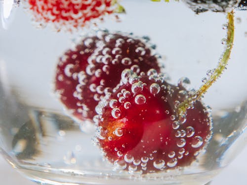 Macro Photography of Air Bubbles on Cherries