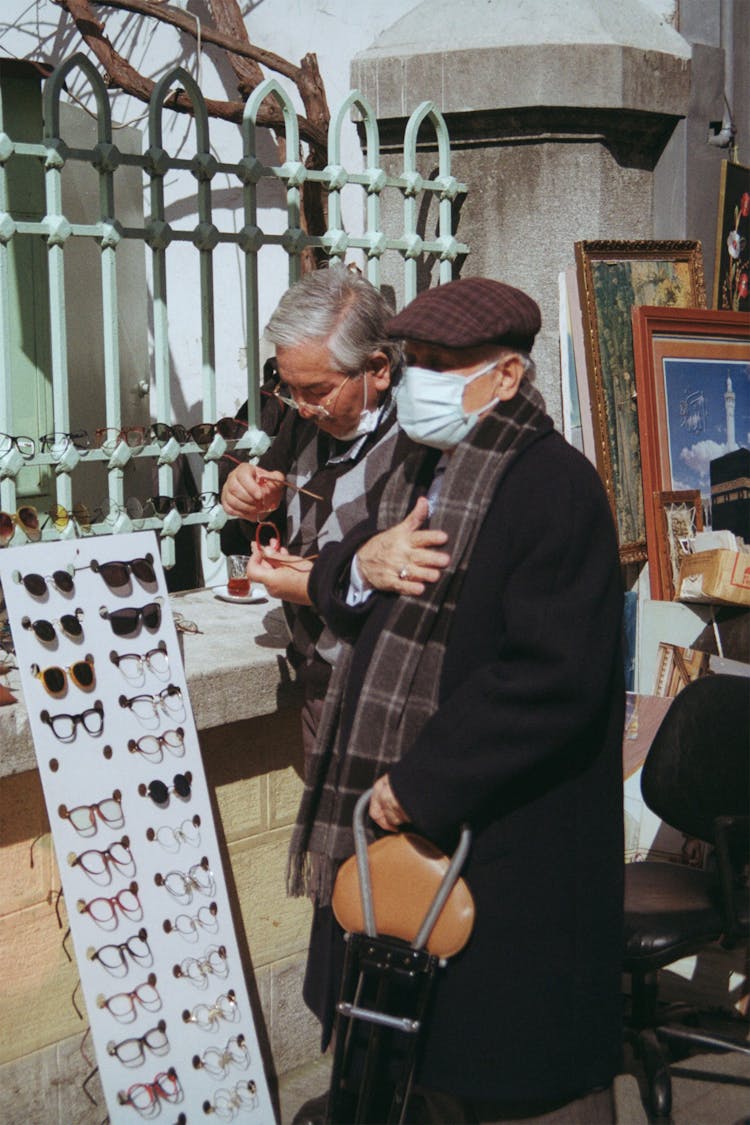 Elderly Men Buying Eyeglasses