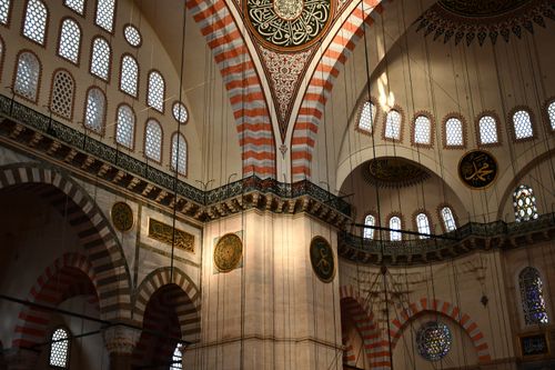 Free Interior of the Süleymaniye Mosque in Istanbul showcasing Islamic art and architectural design. Stock Photo