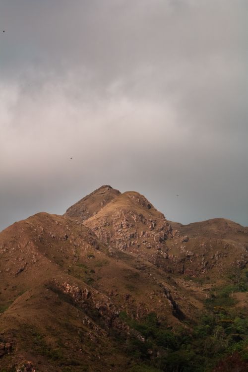 Free A majestic mountain range in Provincia de Coclé, Panama, under a cloudy grey sky. Stock Photo