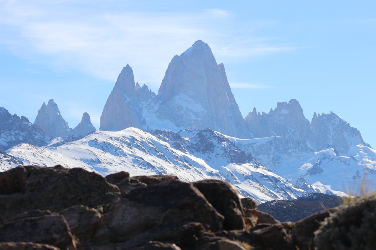 The summit of Mount Fitz Roy rising above the clouds in El Chalten, Argentine Patagonia