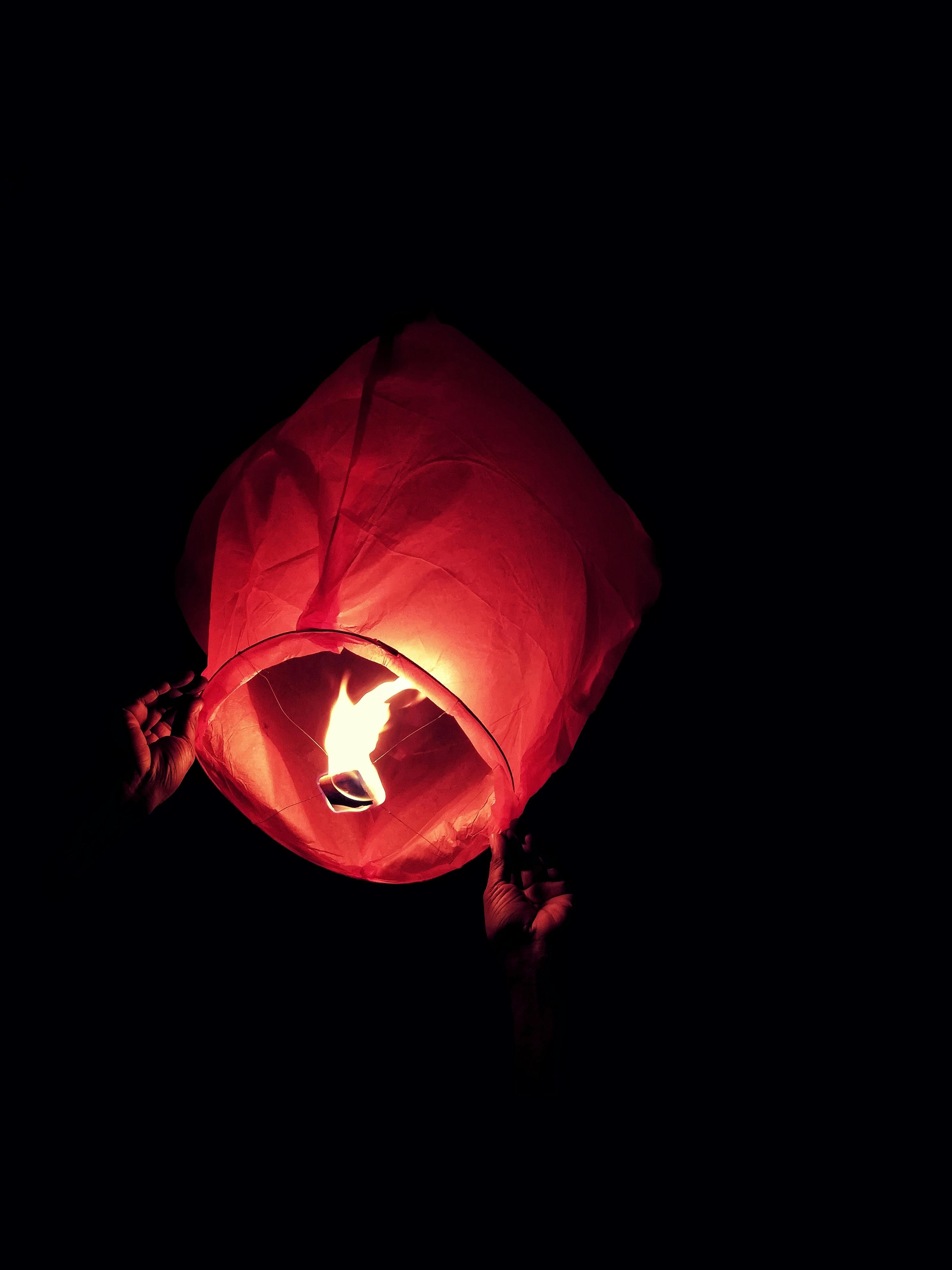 red sky lantern with fire