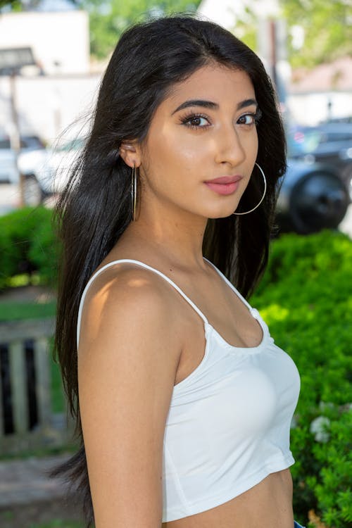 Portrait of a Beautiful Woman with Hoop Earrings