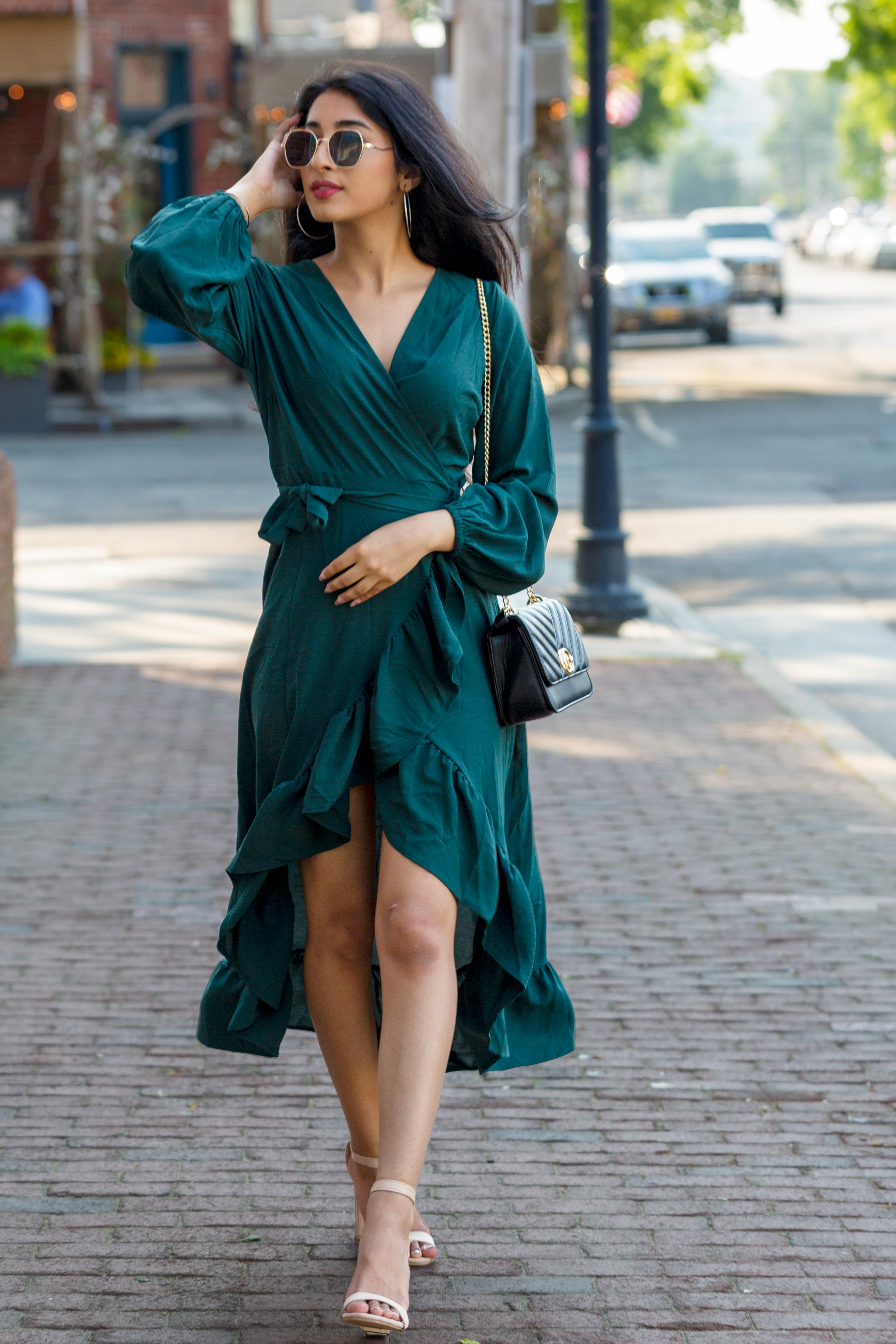 Woman with Sunglasses Wearing a Green Long Sleeves Dress · Free Stock Photo