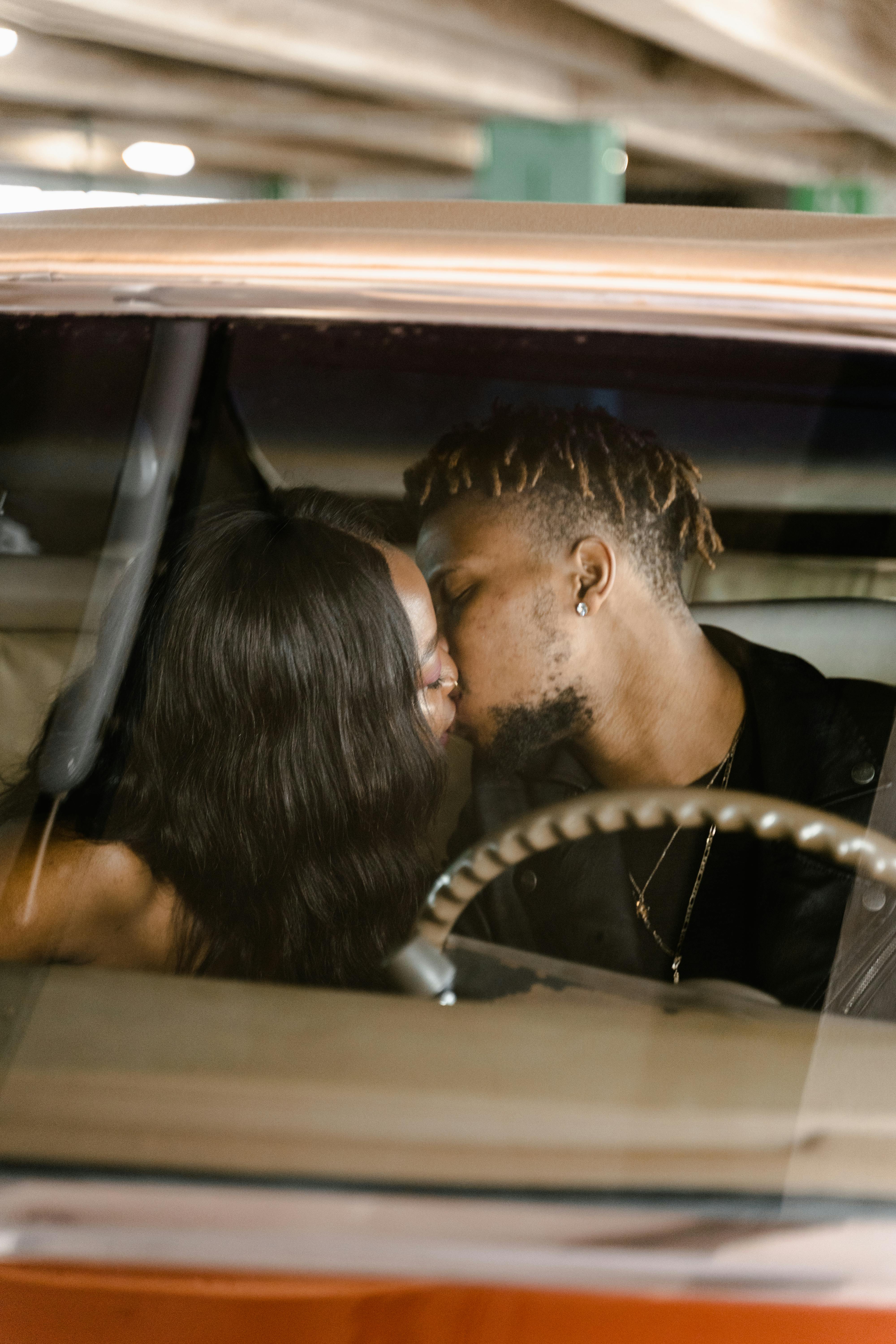 A Couple Sitting in the Car · Free Stock Photo