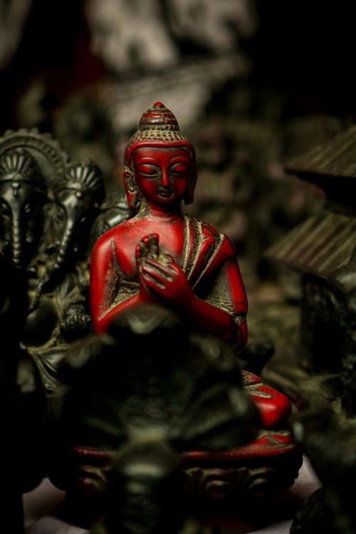 Free Red Buddha Statue in Tilt Shift Lens Stock Photo