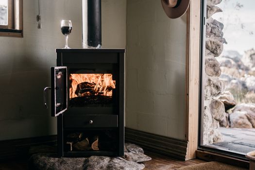 Black Fireplace With Fire Inside