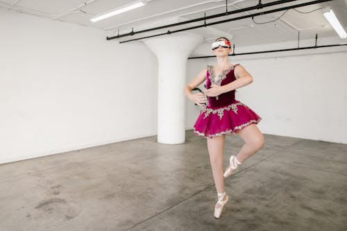 Free A Ballerina Wearing VR Goggles  Stock Photo