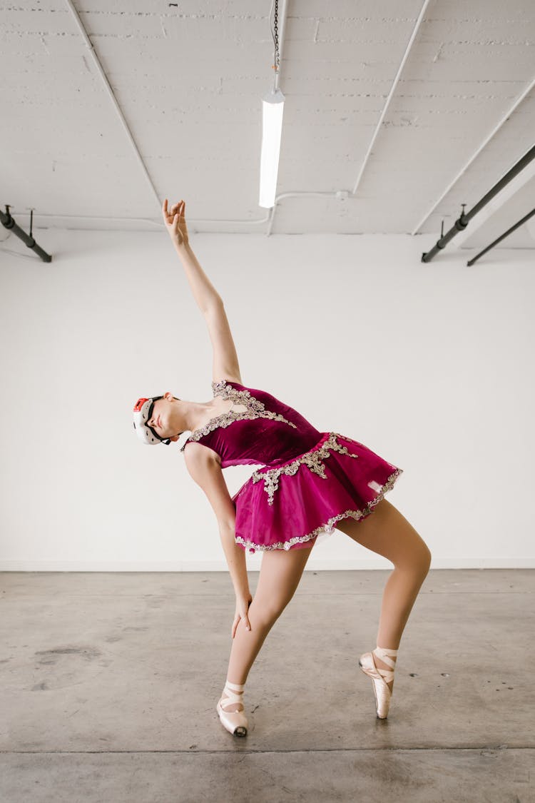 Woman In Pink Dress Dancing Bending Back