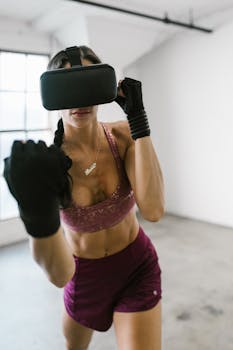 A woman engages in a fitness routine using a VR headset indoors, highlighting modern tech.
