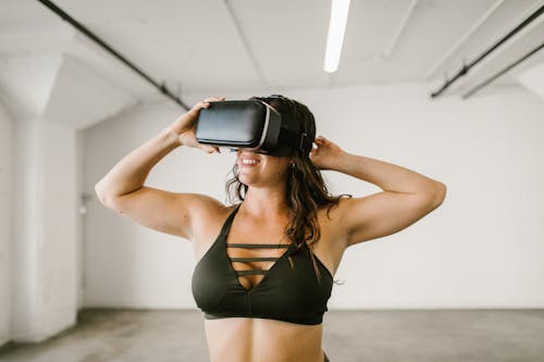 Free Woman wearing Virtual Reality Glasses Stock Photo