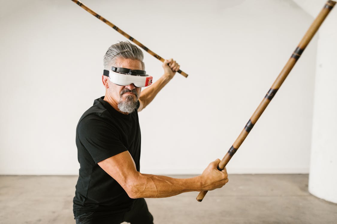 Arnis is usually taught with using two sticks. Photo from Pexels.