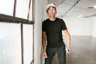 A Man in Black Shirt