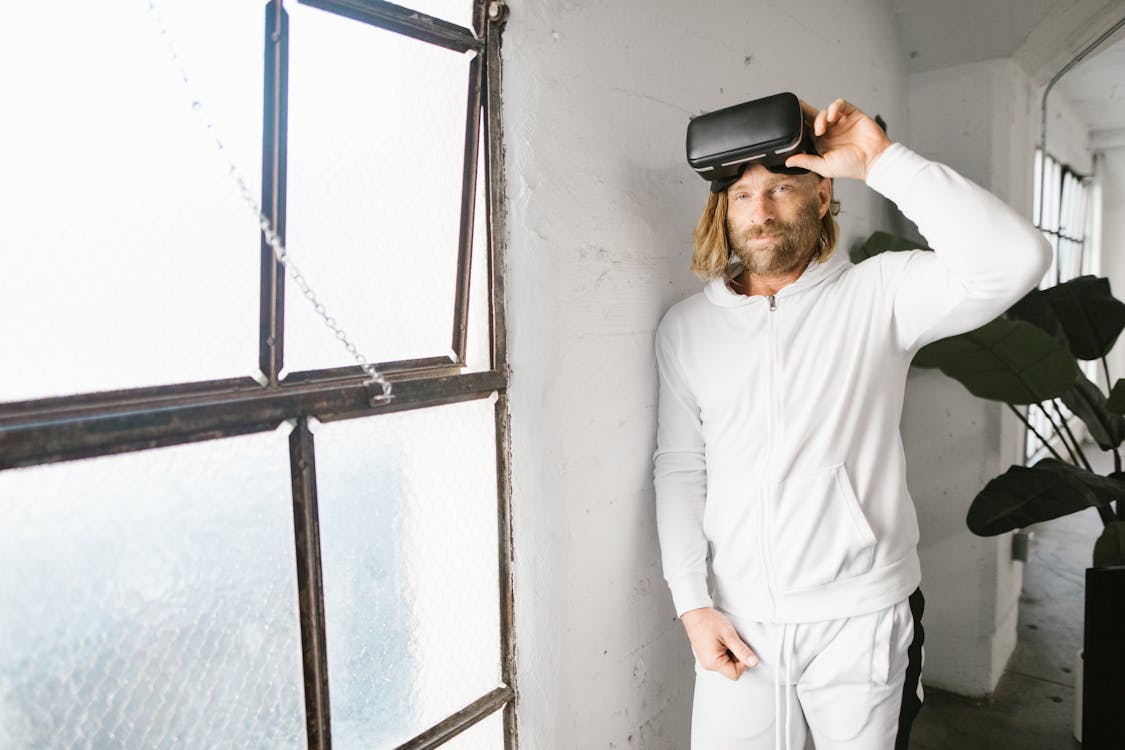 Free Man wearing Virtual Reality Glasses Stock Photo
