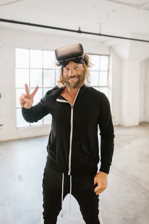 Free Man wearing Virtual Reality Glasses Stock Photo
