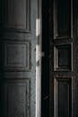 Ajar door of shabby building