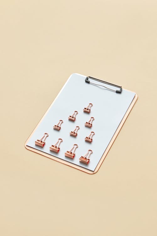 Free Clip Binders on a Clipboard Stock Photo