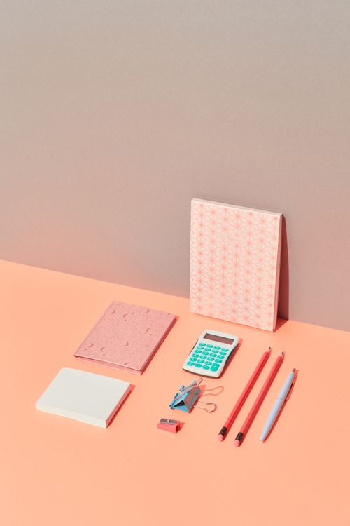 Writing materials laid out on desk