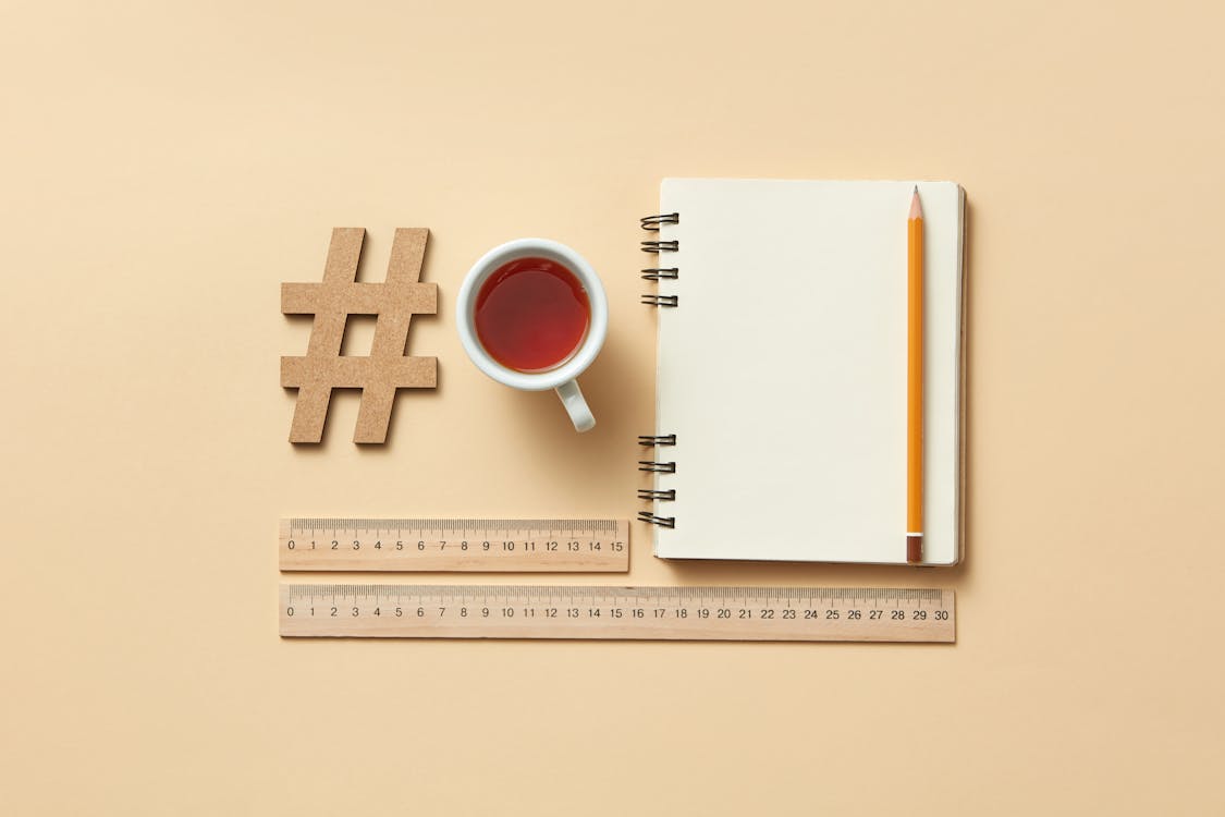 Cup of Tea Near a Notebook